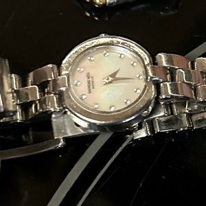 Ladies Raymond Weil diamond and mother of pearl watch .—gorgeous